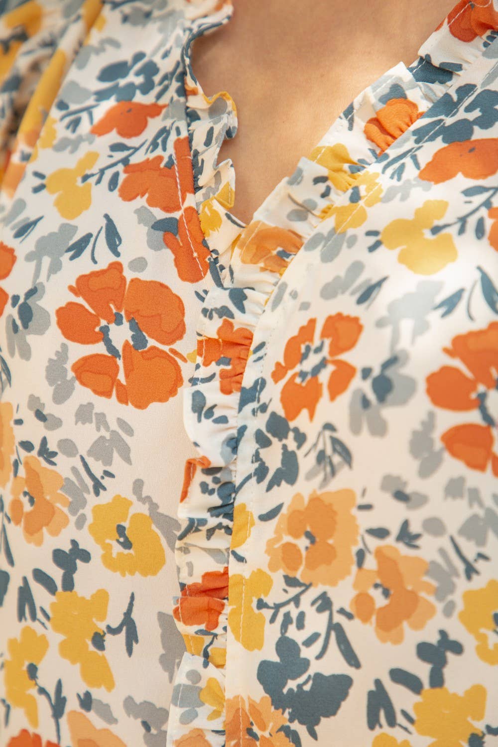 Ruffle neck and sleeve floral top