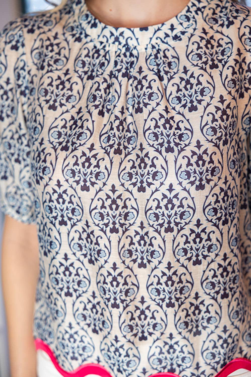 Wavy Hemline Print Top