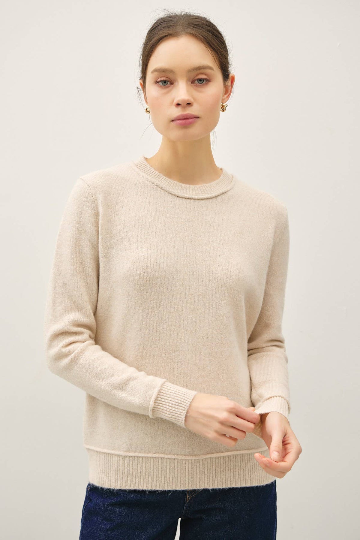 EXPOSED SEAM KNIT SWEATER