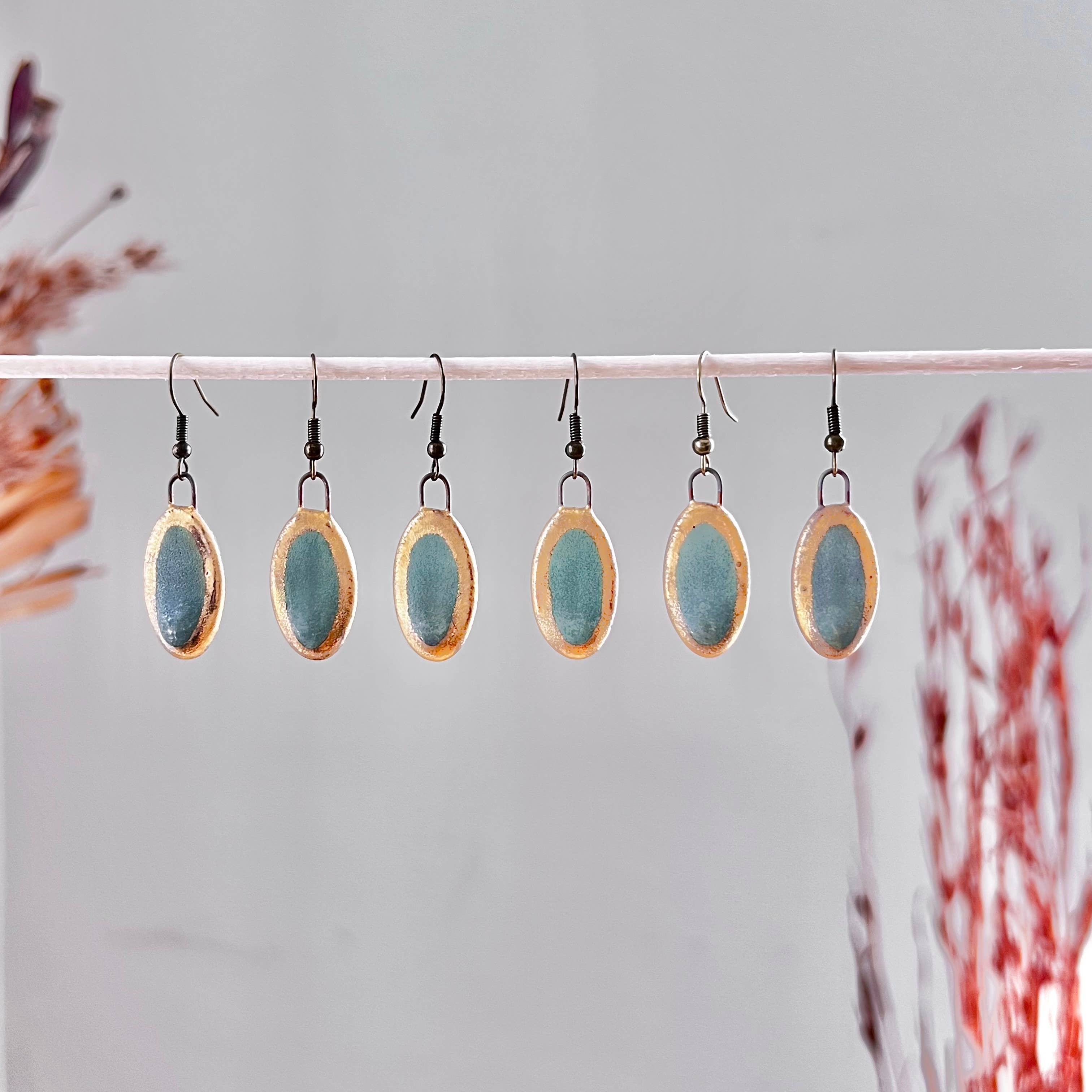 Gold Edge Turquoise Oval Earrings