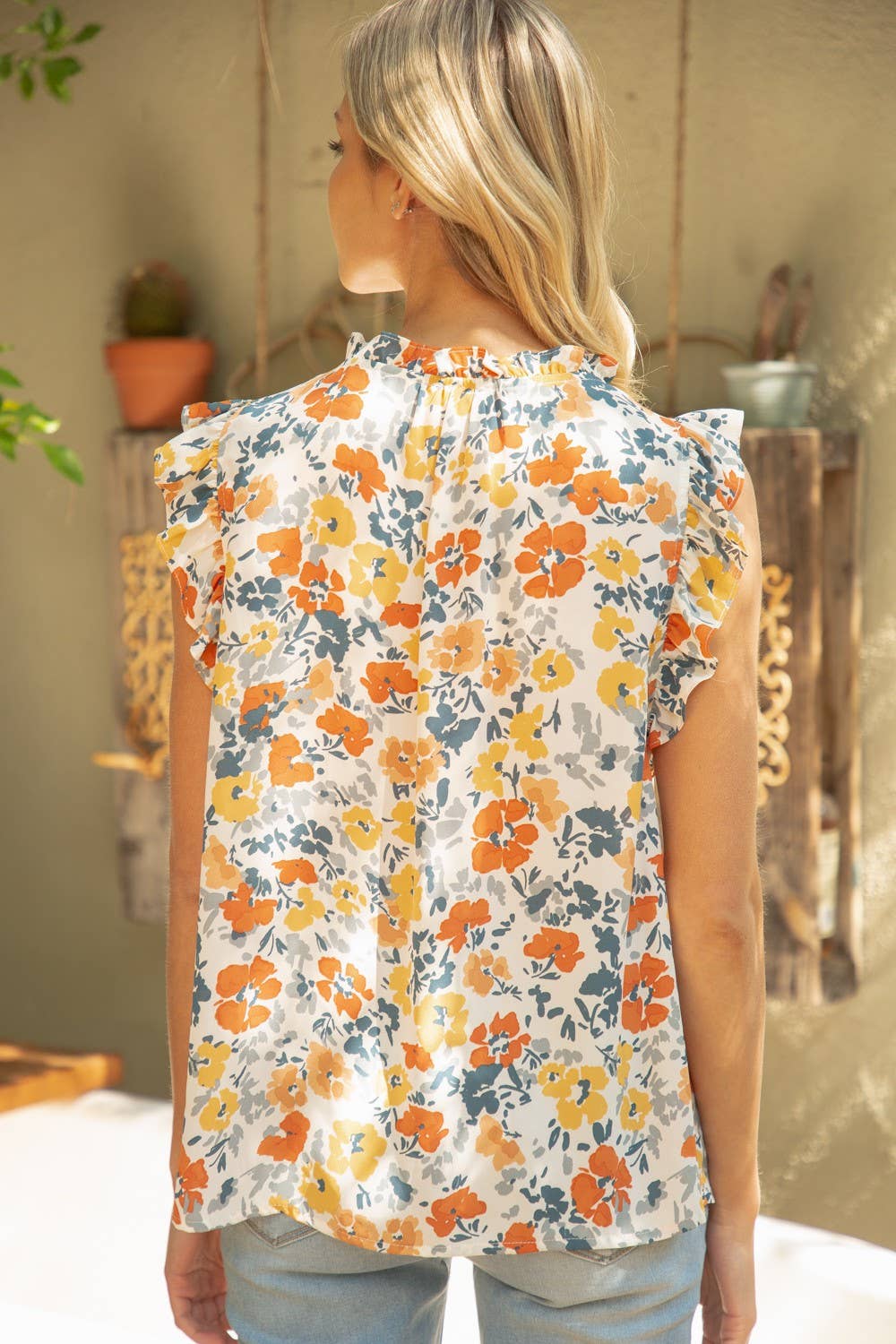 Ruffle neck and sleeve floral top